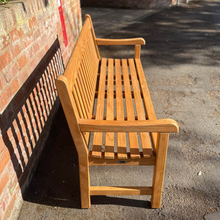 Load image into Gallery viewer, Teak memorial bench in a church setting