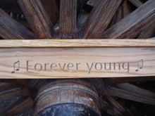 Load image into Gallery viewer, Beam quaver note carved into wood on memorial bench