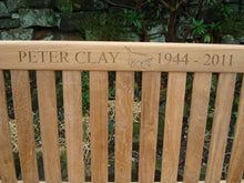 Load image into Gallery viewer, Wheelbarrow symbol carved into wood on a memorial bench - 4mb1508