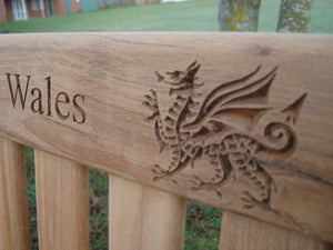 Welsh dragon carved into wood on memorial bench - 4mb1586
