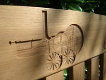 Load image into Gallery viewer, Steam engine carved into wood on a memorial bench - 4mb1897
