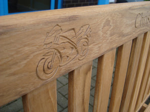 sports motorbike carved into wood on memorial bench - 4mb2071