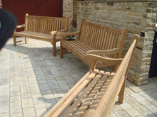 Load image into Gallery viewer, Yorkshire rose carved into wood on a memorial bench - 4mb2511