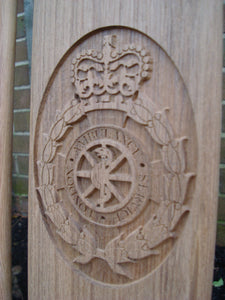 London Ambulance Service crest carved onto memorial bench