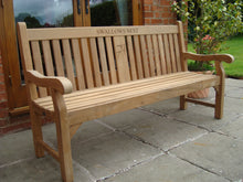 Load image into Gallery viewer, Swallow symbol carving to wood on a memorial bench - 4mb2969