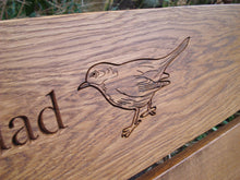 Load image into Gallery viewer, memorial bench with Blackbird carved into wood