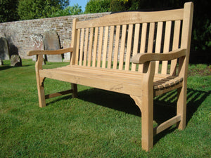 airplane symbol carved into the wood of a memorial bench - 4mb3663