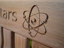Load image into Gallery viewer, memorial bench with Atom symbol carved into wood - 4mb3706