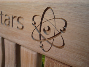 memorial bench with Atom symbol carved into wood - 4mb3706