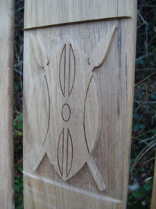 Kenya emblem carved into wood on memorial bench - 4mb2094