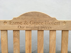 memorial bench with star symbol carved into the wood 4mb4694