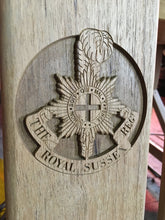 Load image into Gallery viewer, The Royal Sussex Regiment insignia carved on memorial bench