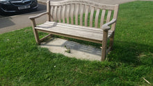 Load image into Gallery viewer, memorial bench with a symbol of a hedgehog carved into wood - 4mb4403