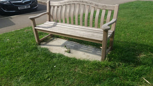 memorial bench with a symbol of a hedgehog carved into wood - 4mb4403