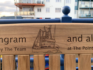 Trawler image carved on memorial bench