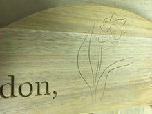 Load image into Gallery viewer, Daffodil engraved on a memorial bench