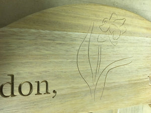 Daffodil engraved on a memorial bench