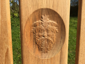 Green man face 3d wood carving into memorial bench - 4mb4222