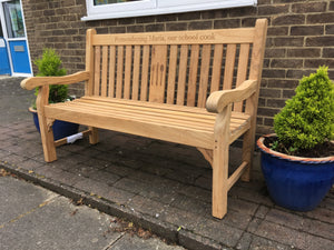 memorial bench with symbol of knife, fork and spoon carved into wood - 4mb4353