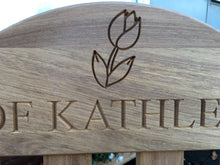 Load image into Gallery viewer, Tulip flower carved on a memorial bench
