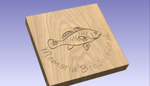 Engraved fish on a memorial bench