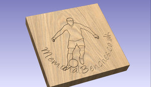 Footballer carved on a memorial bench