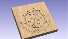 Load image into Gallery viewer, Ladybird image engraving into wood on a memorial bench