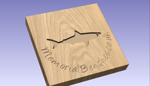 Shark engraved into wood on a memorial bench