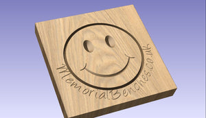 Smiley face emoji carved into wood