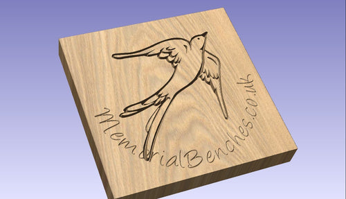 Swallow carved into wood on a memorial bench